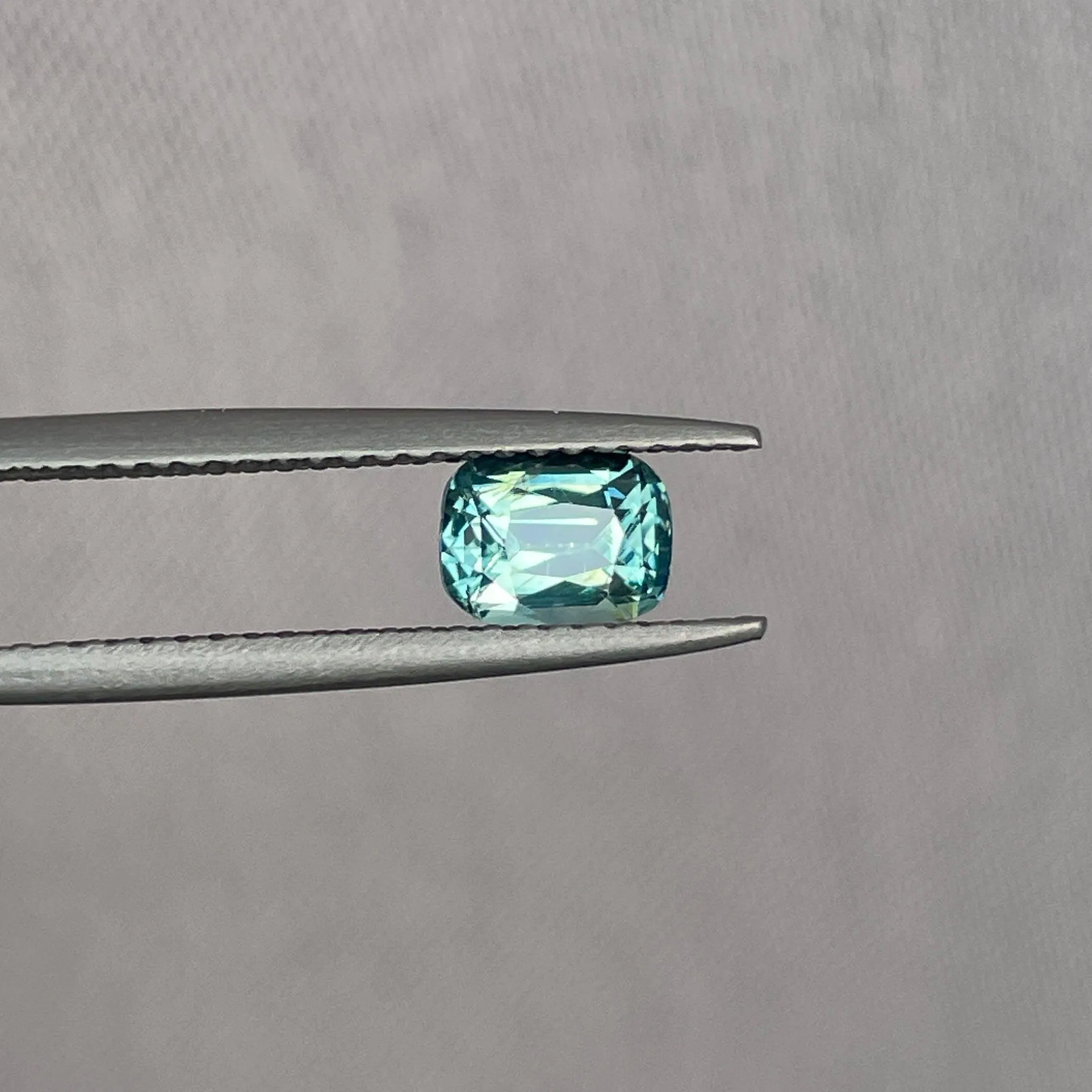 This 1.00 crt Green Sapphire is well cut to bring out the best colour and lustre, and has a perfect colour blend.